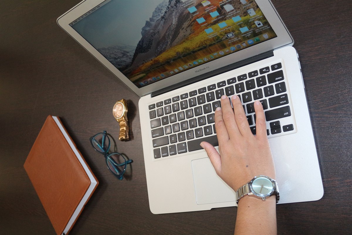 Laptop-based client work at Krutin Advisors